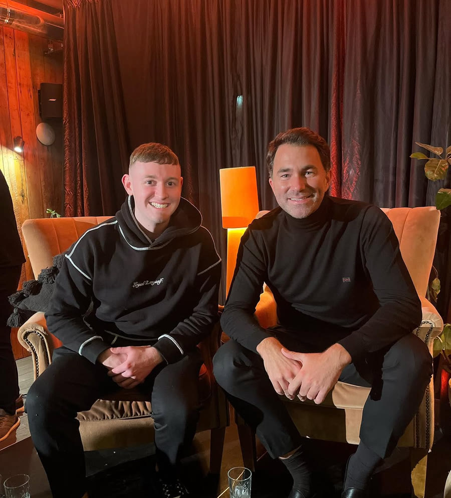Louie on set with a well-known guest
